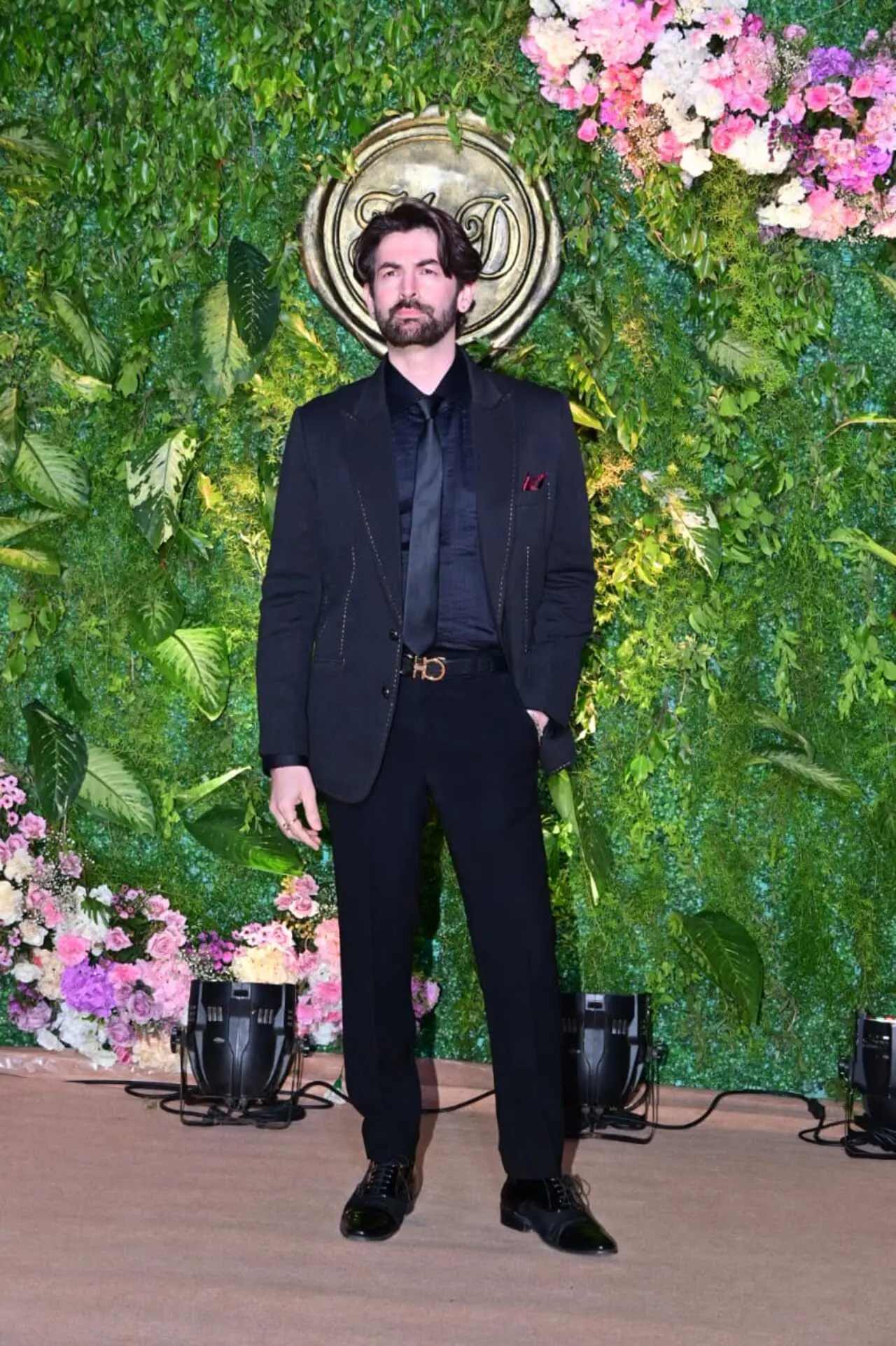 Neil Nitin Mukesh looked sharp and sophisticated in an all-black formal suit set at the event. The actor opted for a well-tailored black blazer paired with a matching shirt and trousers.